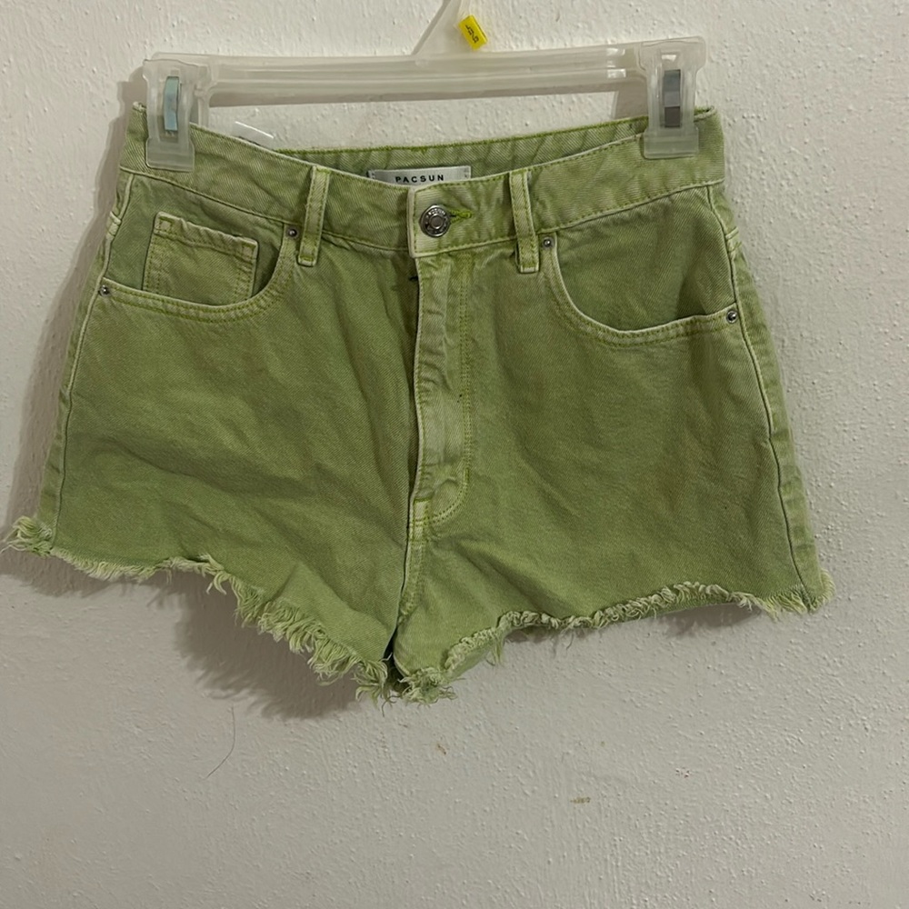 washed neon green jean shorts.